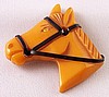 BP263 butterscotch bakelite horse head pin